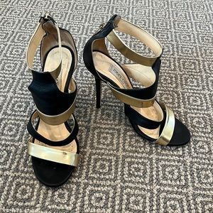 JIMMY CHOO Black and Gold Caged Heels